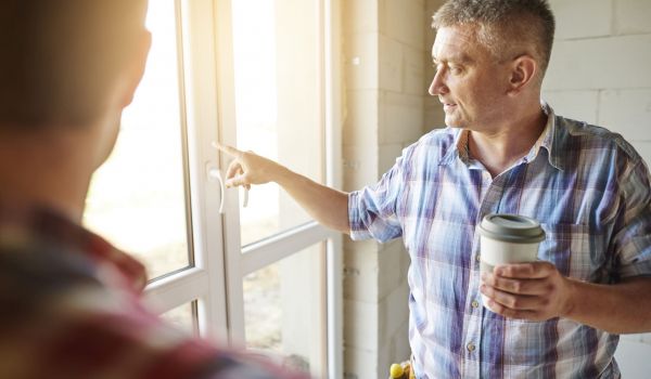 Window consultant listening to customer about window solutions